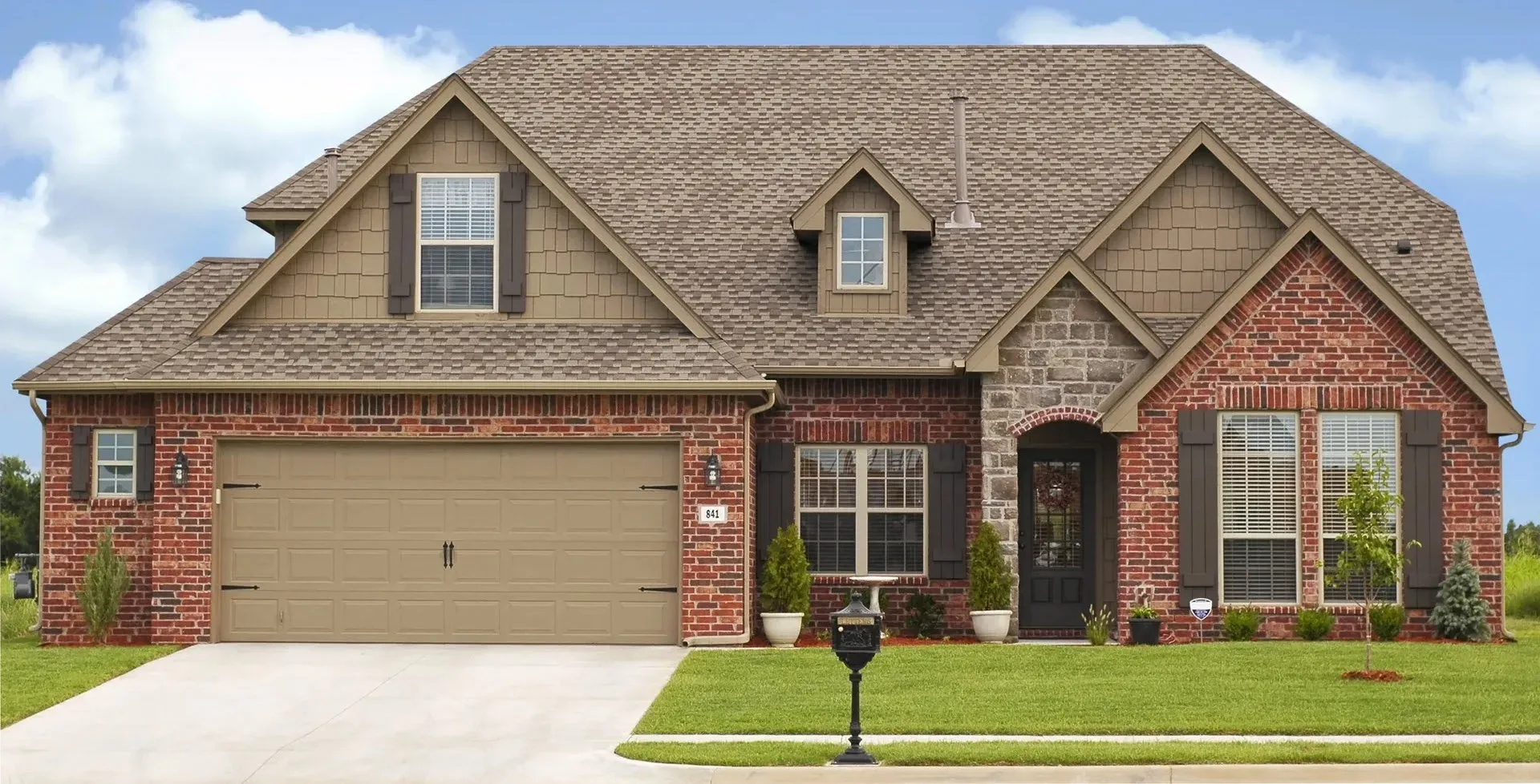 Brick Springfield home with new windows installed by Window Dudes
